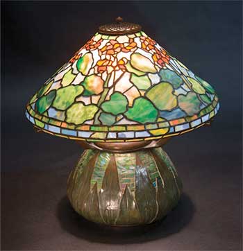 Tiffany Studios Geranium Table Lamp With An Arrowhead Bronze and Iridescent Favrile Glass Mosaic Base